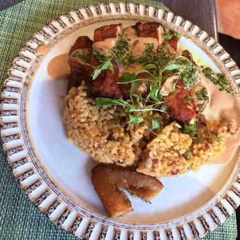 Néctar - Chicken Breast - Lightly breaded with "alcapurria" tempura and garlic sauce. Accompanied by "apastelado" rice. - Diners Near Me - Río Grande, Puerto Rico