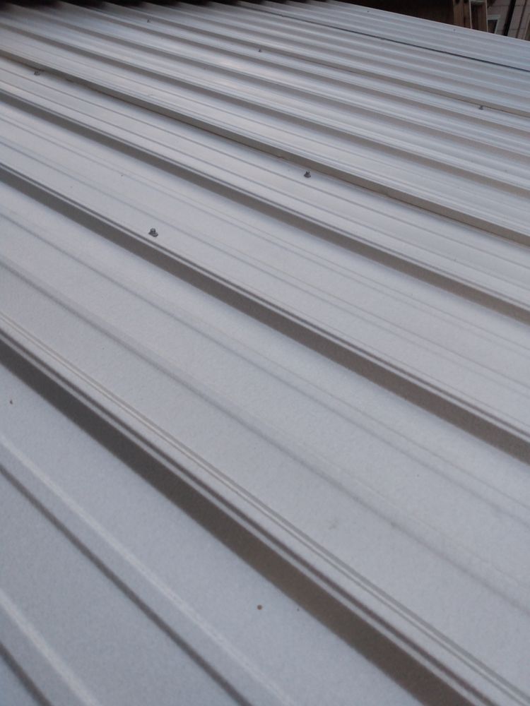 Slide of UnZucky Roofing