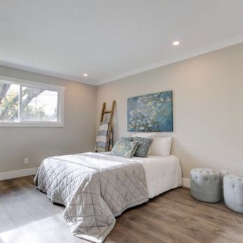 POC Construction - a bedroom with hardwood floors - General Contractors Near Me - Vacaville, California POC Construction - a bedroom with hardwood floors - General Contractors Near Me - Vacaville, California