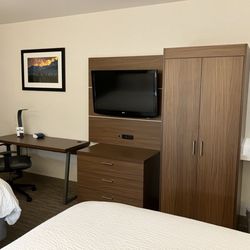Holiday Inn Express - Second example of art, desk, dresser, closet, TV
