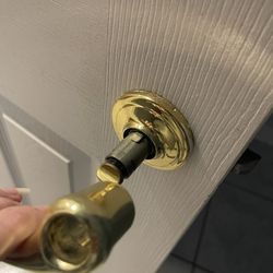 Vortex Spring Adventures - Me holding the bathroom door knob that came off
