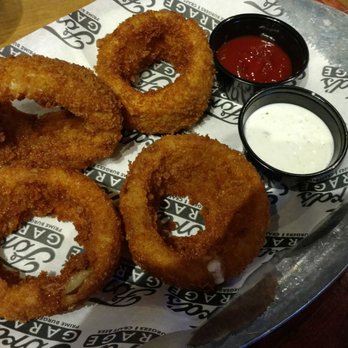 Ford's Garage Dearborn - Side of onion rings - Burgers Near Me - Dearborn, Michigan Ford's Garage Dearborn - Side of onion rings - Burgers Near Me - Dearborn, Michigan