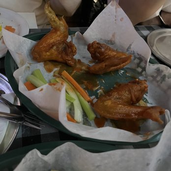 Mother Hubbard's - a tray of chicken wings and french fries - Sports Bars Near Me - Chicago, Illinois