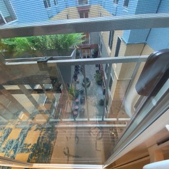 Belltown Inn - Views from the 4th floor elevator area overlooking interior building courtyard -- October 2025 - Hotels Near Me - Seattle, Washington