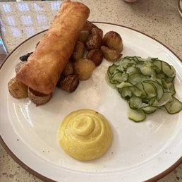 Brik crusted walleye, cucumber salad, confit potato, vadouvan curry remoulade. Brik crusted walleye, cucumber salad, confit potato, vadouvan curry remoulade.