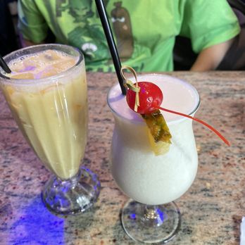 Malecon Restaurant - Orange justice with milk, and Pina Colada - Dominican Near Me - New York, New York Malecon Restaurant - Orange justice with milk, and Pina Colada - Dominican Near Me - New York, New York