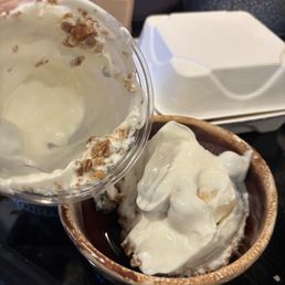 Yogurt with a few granola sprinkles Yogurt with a few granola sprinkles