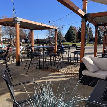 The TRN Grandview - a patio with tables and chairs - Golf Near Me - Arvada, Colorado The TRN Grandview - a patio with tables and chairs - Golf Near Me - Arvada, Colorado