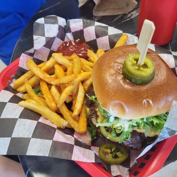 Stacked Burger - Stacked Burger with jalapenos and seasoned fries. - Burgers Near Me - Columbus, Ohio Stacked Burger - Stacked Burger with jalapenos and seasoned fries. - Burgers Near Me - Columbus, Ohio