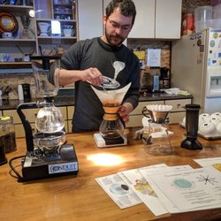 Conduit Coffee Roasters - Coffee tour host, Jesse, brewing our 100th cup of coffee