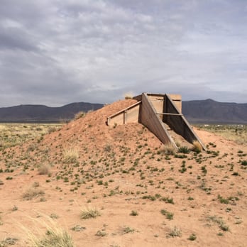 White Sands Missile Range - Trinity Site - The bunker that housed cameras used to document the first nuclear test. Ground zero is in the background. - Historical Tours Near Me - White Sands, New Mexico