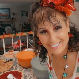Julie A at a Christmas event with my cherry cake....it was a bit hit!