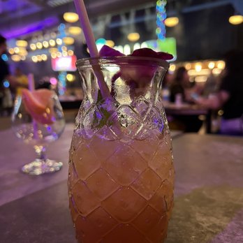 So Far So Good - a pineapple drink in a glass - Cocktail Bars Near Me - Phoenix, Arizona So Far So Good - a pineapple drink in a glass - Cocktail Bars Near Me - Phoenix, Arizona