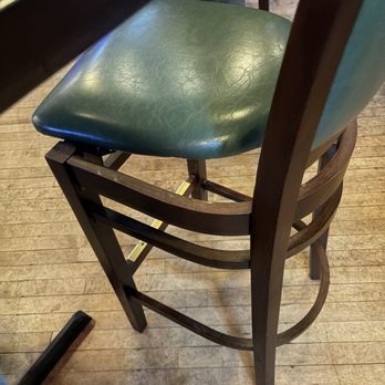 Sweet Caroline’s Kitchen & Cocktails - Broken chair - Sports Bars Near Me - Ames, Iowa