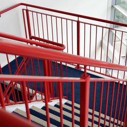 Town Gate - Stairs and red metal handrails design and manufacturing