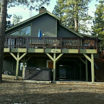 Big Bear Vacations - View of the back of the house from the lake. Upper deck with 3rd bedroom, pool table game room and Jacuzzi underneath. - Vacation Rentals Near Me - Big Bear Lake, California