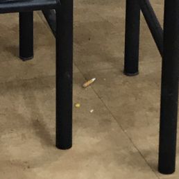 Cig butt on the floor. Cig butt on the floor.