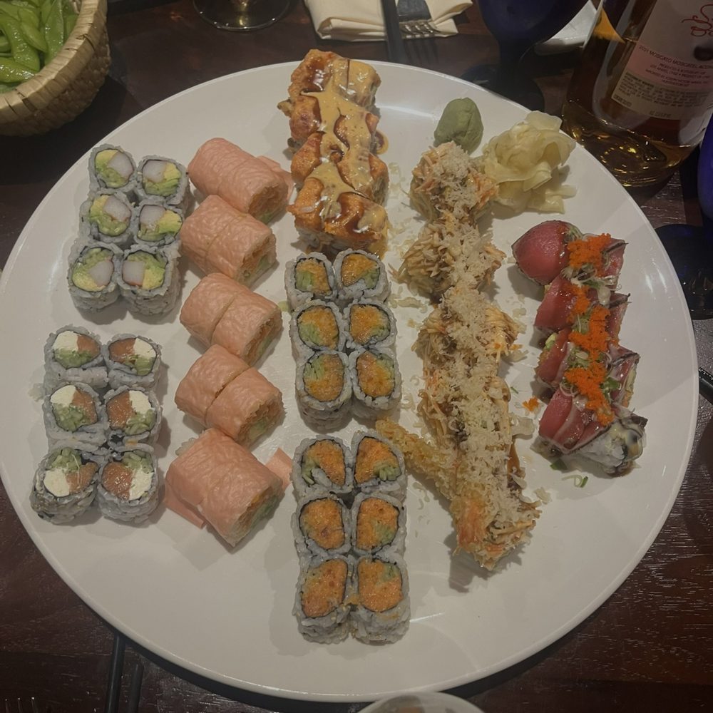 Aozora - the whole table's sushi rolls came on a big platter and they gave us individual plates - Japanese Near Me - Montclair, New Jersey Aozora - the whole table's sushi rolls came on a big platter and they gave us individual plates - Japanese Near Me - Montclair, New Jersey