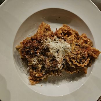Semo Pasta + Wine - a plate of pasta with grated parmesan cheese - Italian Near Me - Fremont, Nebraska Semo Pasta + Wine - a plate of pasta with grated parmesan cheese - Italian Near Me - Fremont, Nebraska