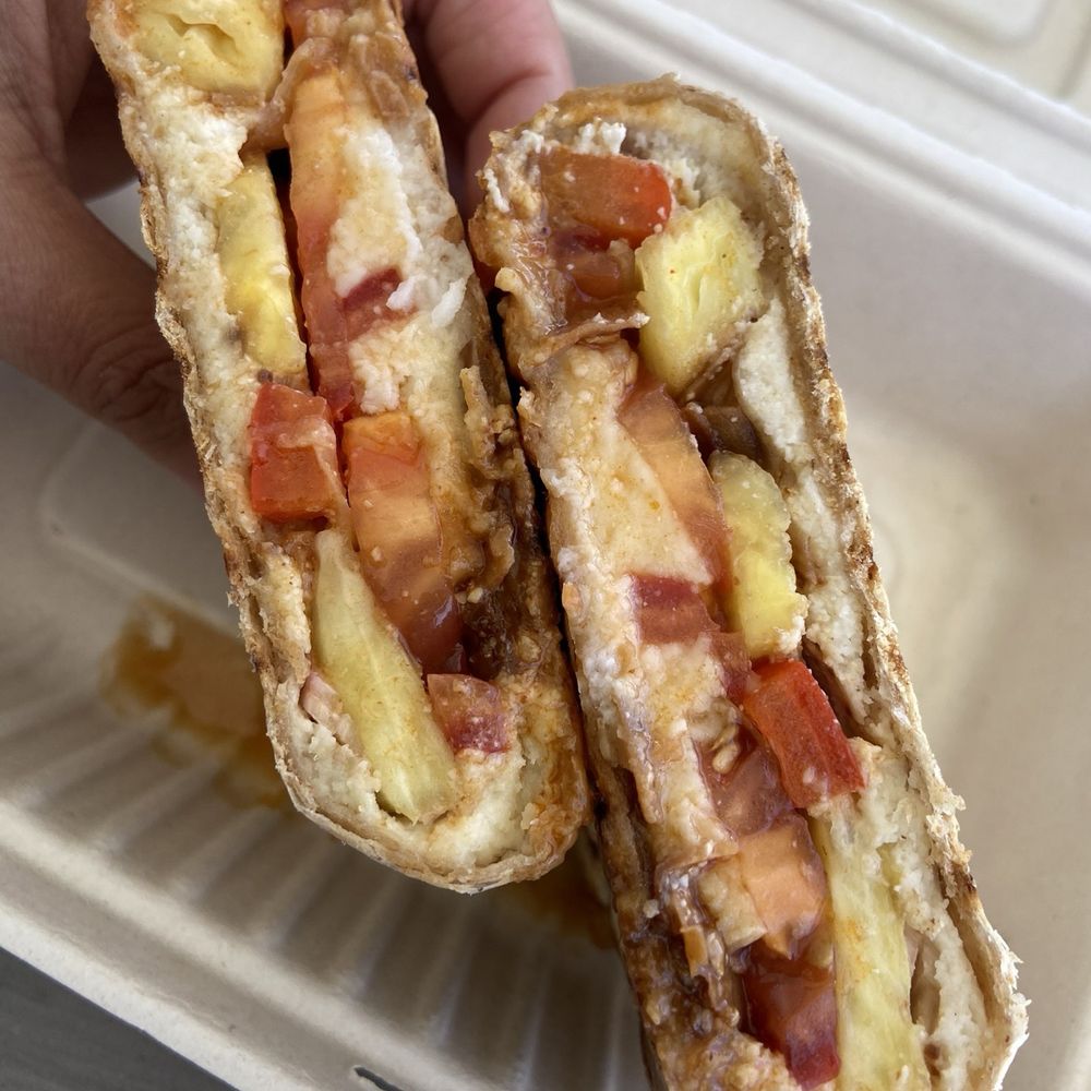 Shine On Juicery - Pineapple pizza panini wrap - Juice Bars & Smoothies Near Me - Kill Devil Hills, North Carolina Shine On Juicery - Pineapple pizza panini wrap - Juice Bars & Smoothies Near Me - Kill Devil Hills, North Carolina