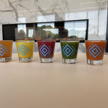 The Feel Better Lounge - The "Hi-Five" wellness shot flight featuring all 5 of our wellness shots - IV Hydration Near Me - Richmond, Virginia The Feel Better Lounge - The "Hi-Five" wellness shot flight featuring all 5 of our wellness shots - IV Hydration Near Me - Richmond, Virginia