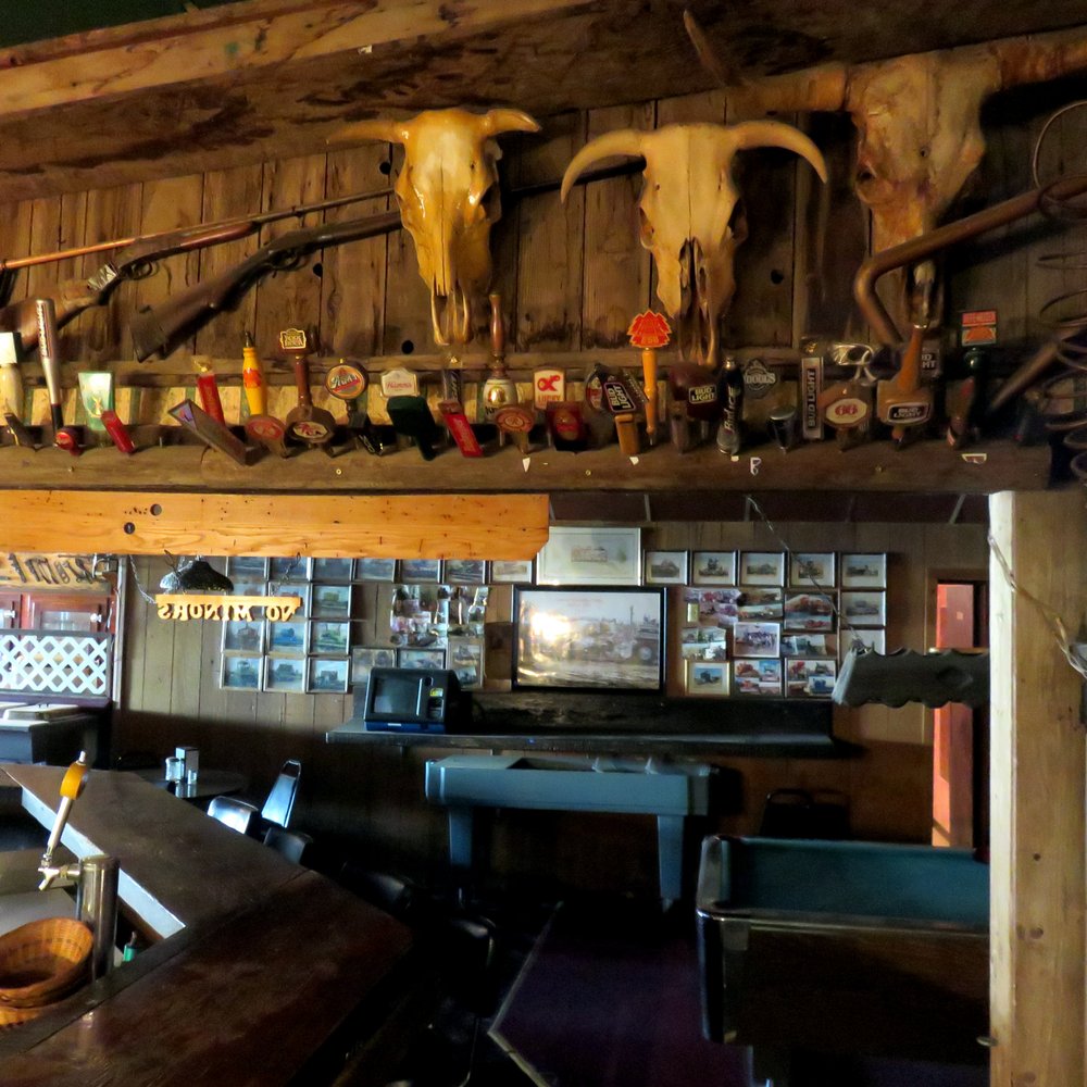 Slim's Tavern - a bar with a cow skull on the wall - Bars Near Me - Lind, Washington Slim's Tavern - a bar with a cow skull on the wall - Bars Near Me - Lind, Washington