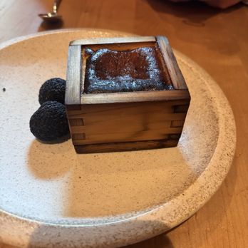 Doko - Cheesecake was moist, delicious, and rich! The sesame chocolate balls on the side really made the dessert. - Sushi Bars Near Me - Houston, Texas