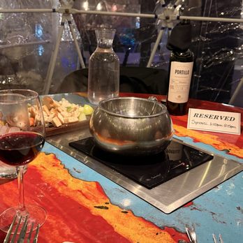 The Melting Pot - The pot before the glob of cheese ,pretzel bread and apples (boring). - Fondue Near Me - Littleton, Colorado