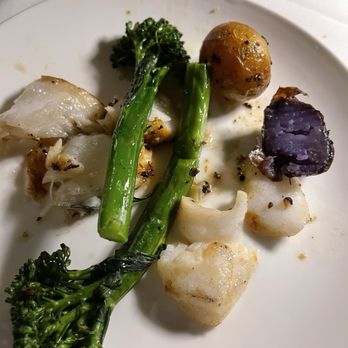 Landini Brothers - My portion of the Chilean sea bass with potatoes and broccolini as sides. - Italian Near Me - Alexandria, Virginia