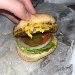 Snack Shack - Double Cheesburger, dressed. $6.50
