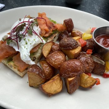 Virginia Inn - Avocado toast topped with a soft poached egg and salmon - Bars Near Me - Seattle, Washington Virginia Inn - Avocado toast topped with a soft poached egg and salmon - Bars Near Me - Seattle, Washington