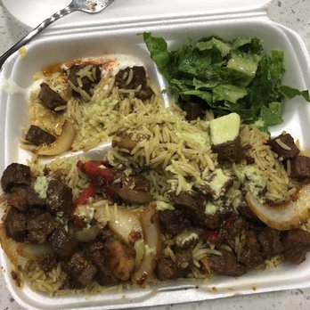 Samosa House - Camel & rice w/ hot sauce - African Near Me - Edmonton, Alberta Samosa House - Camel & rice w/ hot sauce - African Near Me - Edmonton, Alberta