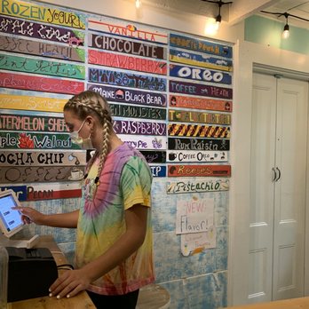 Sweet Pea's Ice Cream - a woman using a tablet - Ice Cream & Frozen Yogurt Near Me - Ogunquit, Maine