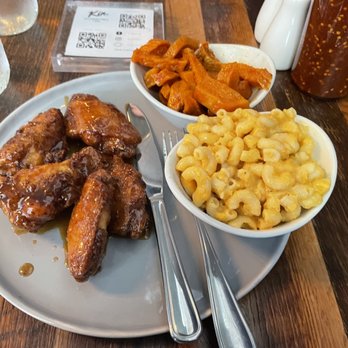 Kin Southern Table + Bar - Honey garlic wings with yams and Mac and cheese - Soul Food Near Me - Providence, Rhode Island Kin Southern Table + Bar - Honey garlic wings with yams and Mac and cheese - Soul Food Near Me - Providence, Rhode Island