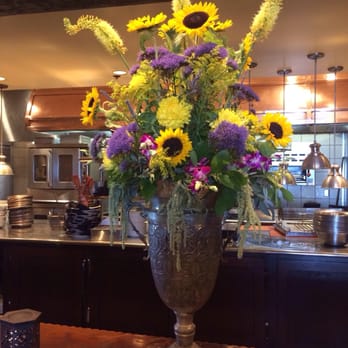 Summit House - Beautiful arrangement that greets us as we enter the hall towards the dining areas. - Steakhouses Near Me - Fullerton, California