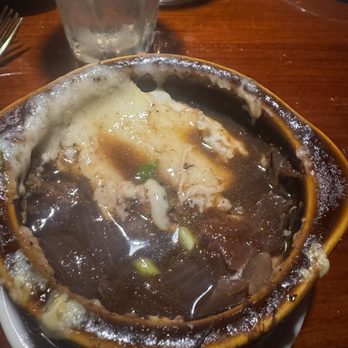 Braised Onion - Braised Onion Soup. There was a lot more cheese, but I had already dug into it. - New American Near Me - Ocala, Florida