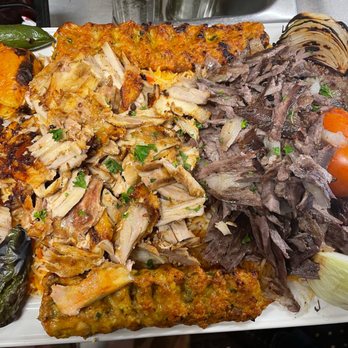 Kabab Guys - a platter of meat and vegetables - Mediterranean Near Me - Syracuse, New York Kabab Guys - a platter of meat and vegetables - Mediterranean Near Me - Syracuse, New York