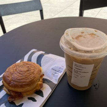 Starbucks - Grande Iced Caramel Macciato Upside Down + Oakmilk Double Smoked Bacon, Cheddar, & Egg Sandwich - Coffee & Tea Near Me - Los Angeles, California Starbucks - Grande Iced Caramel Macciato Upside Down + Oakmilk Double Smoked Bacon, Cheddar, & Egg Sandwich - Coffee & Tea Near Me - Los Angeles, California