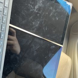 damaged screen that was not there before + rubber band they used to hold it together.