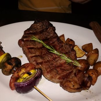 Truffle Bistro - 12oz Ribeye steak $28 (looks good but too bad the meat was spoiled!) - Italian Near Me - Orange, California Truffle Bistro - 12oz Ribeye steak $28 (looks good but too bad the meat was spoiled!) - Italian Near Me - Orange, California
