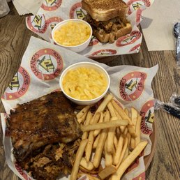 Pulled pork sandwich, ribs, and bbq pork