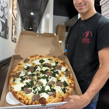 Roman Gourmet - Lucas with one of his specialties!! - Pizza Near Me - Warren, New Jersey Roman Gourmet - Lucas with one of his specialties!! - Pizza Near Me - Warren, New Jersey