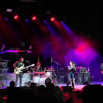 Pompano Beach Amphitheatre - a band performing on stage - Performing Arts Near Me - Pompano Beach, Florida