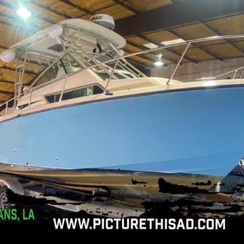 Picture This Wraps and Graphics - large fishing boat color change wrap. - Signmaking Near Me - Mandeville, Louisiana