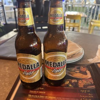 La Parrilla - Cold Medalla light - Latin American Near Me - Luquillo, Puerto Rico
