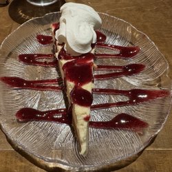 The Cabin Bar & Grill - Homemade Cheesecake with Huckleberry Sauce!!