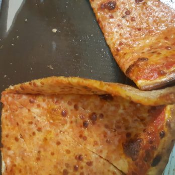 FBI PIZZA - two slices of pizza on a pan - Italian Near Me - Toronto, Ontario