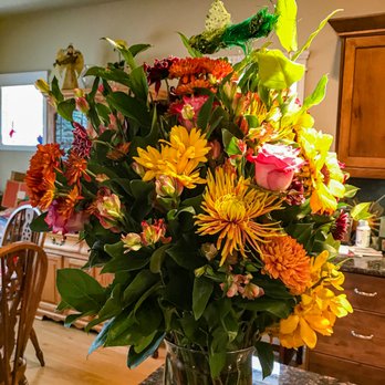 Sunflower Florist - Mom especially loved the bird they added and I hadn't even asked for it. - Florists Near Me - Garden City, Idaho Sunflower Florist - Mom especially loved the bird they added and I hadn't even asked for it. - Florists Near Me - Garden City, Idaho