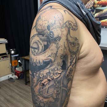 Tattmachine - Octopus and pirate ship - Tattoo Near Me - Vista, California Tattmachine - Octopus and pirate ship - Tattoo Near Me - Vista, California