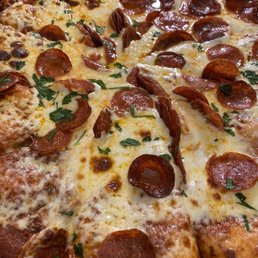 a pepperoni pizza in a box